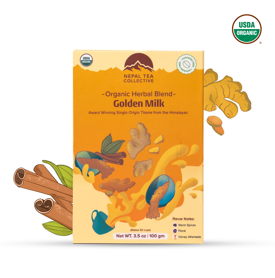 Organic Golden Milk blend from Nepal Tea displayed in a bowl with a warm, golden color and fresh turmeric root.