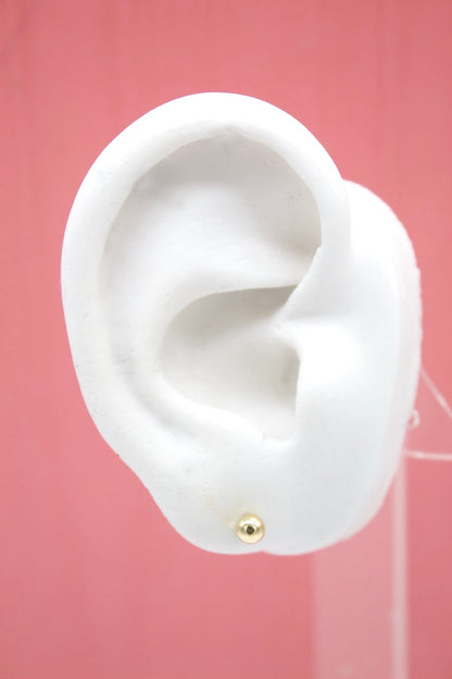 Small 18K gold filled ball stud earrings by MIA Jewelry, minimalist jewelry accessory with shiny gold finish