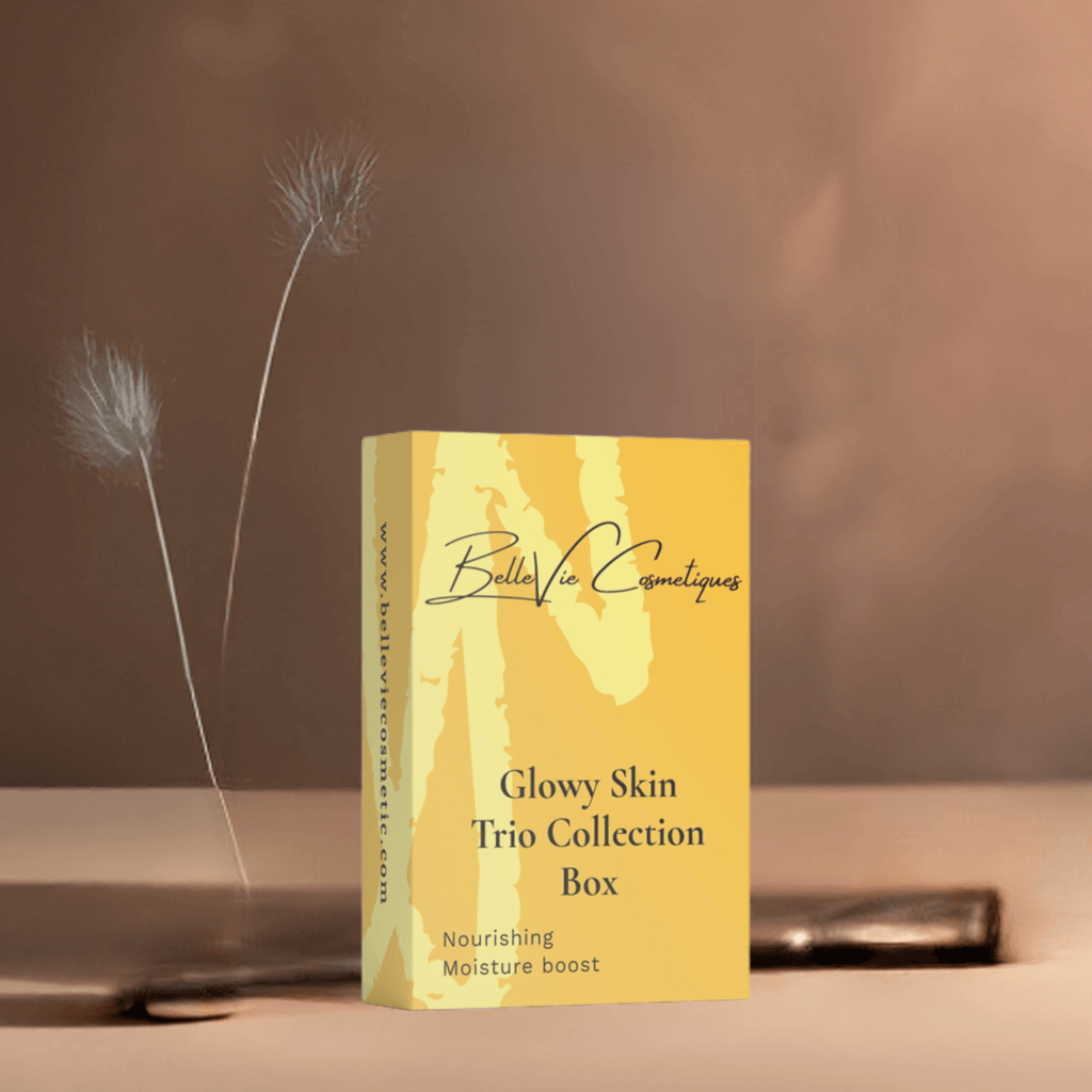 BelleVie Cosmétiques Glowy Skin Trio box with gentle cleansing milk, moisturizing day cream, and nourishing facial oil bottles.