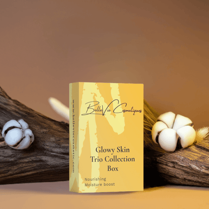 BelleVie Cosmétiques Glowy Skin Trio box with gentle cleansing milk, moisturizing day cream, and nourishing facial oil bottles.