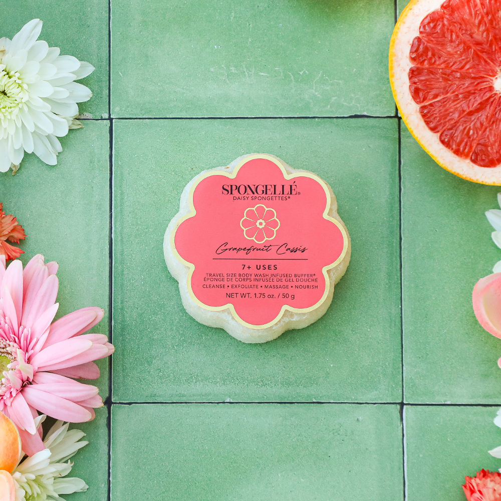 Spongellé Grapefruit Cassis Daisy Spongette body wash infused buffer with bright grapefruit and cassis scent, showcasing the product texture.