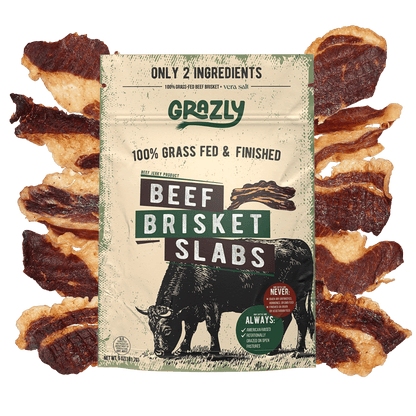 Grazly beef brisket slabs, 100% grass-fed and finished, showing raw, marbled meat on a clean surface.
