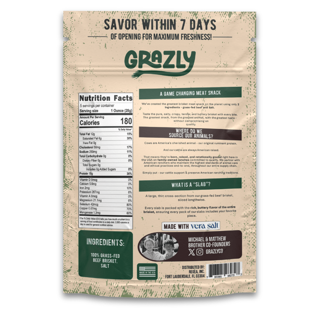 A pack of Grazly beef brisket slabs, 100% grass-fed and finished, showing fresh raw meat with marbling and packaging labels.