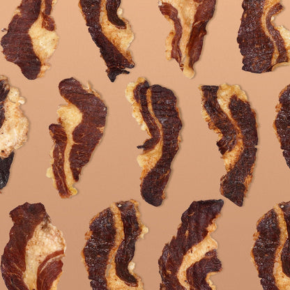 Grass-fed beef brisket slabs from Grazly, raw meat with marbling, ideal for slow cooking or smoking.