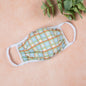 Vibrant cloth face mask with Americana design by GreaterGood, made in the USA, featuring colorful patterns and comfortable fit.