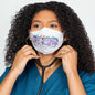 GreaterGood Read My Lips embroidered face mask with pink and black design, adjustable ear loops, and breathable fabric.