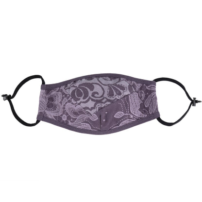 Blue organic reversible face mask with patched design by GreaterGood, made for comfortable, eco-friendly face covering.