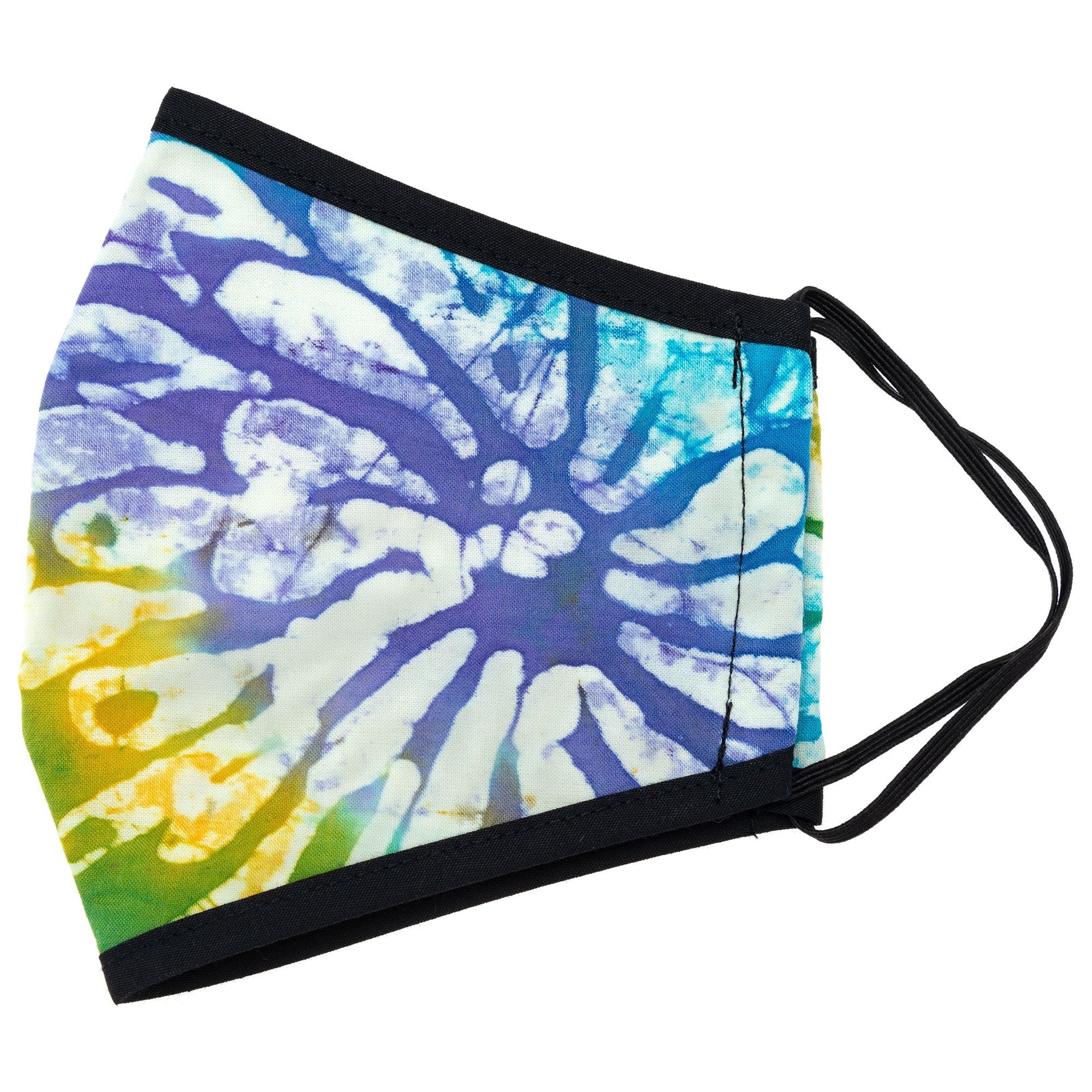 Batik Delight face mask by GreaterGood with colorful dragonfly and floral pattern, made of fabric for comfortable wear.