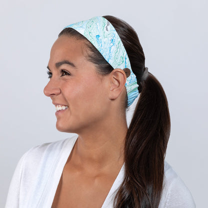 Green and blue Marbleous color face mask with matching headband from GreaterGood, made of comfortable fabric for face covering and accessories.