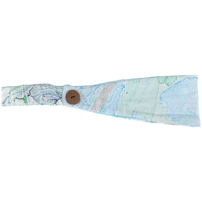 Green and blue marble pattern face mask and matching headband from GreaterGood, made from comfortable fabric.