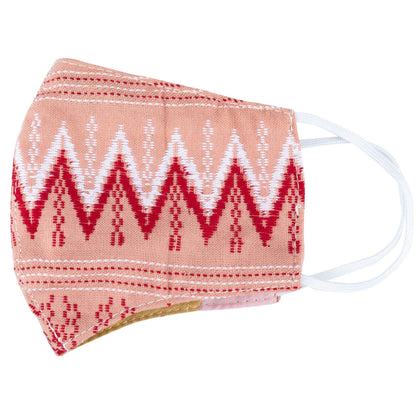 Handwoven GreaterGood face mask with colorful fabric, soft ear loops, and mask accessories for comfortable wear and protection.