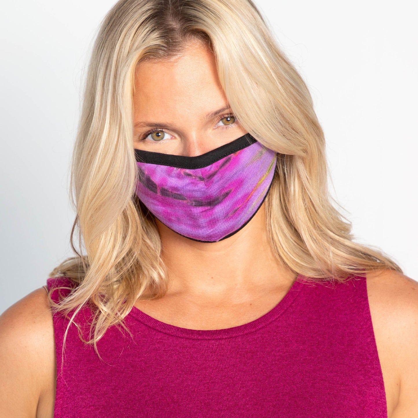 Set of three tie-dye face masks from GreaterGood, protective face mask and accessories with colorful, vibrant patterns.