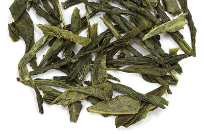 Loose leaf green tea from China with vibrant green tea leaves, ideal for brewing fresh green tea.