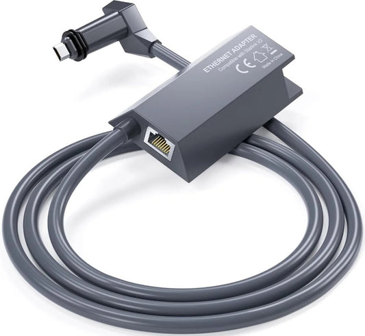 Starlink Gen 2 Ethernet adapter in dark grey, plug-and-play design for stable, fast connection with Starlink routers.
