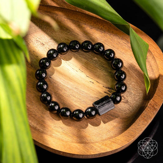 Black Obsidian and Tourmaline bracelet from Conscious Items featuring natural stone beads on a stretchy band.