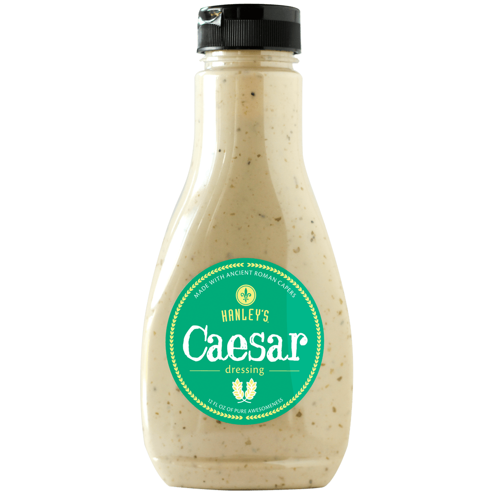 Hanley's Foods Caesar dressing bottle, creamy dressing for salads in a clear plastic container with a label.