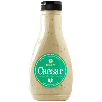 Hanley's Foods Caesar dressing bottle, creamy dressing for salads in a clear plastic container with a label.