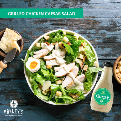 Creamy Caesar dressing from Hanley's Foods in a jar, perfect for salads and dipping, with a rich, savory appearance.