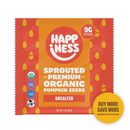 Unsalted sprouted pumpkin seeds from Happiness Minis by happinessfoods.com, shown in a small 1oz package with seeds spilling out.