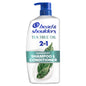 Head & Shoulders 2-in-1 Dandruff Shampoo and Conditioner with Tea Tree Oil in a 28.2 fl oz bottle, shown with product label.