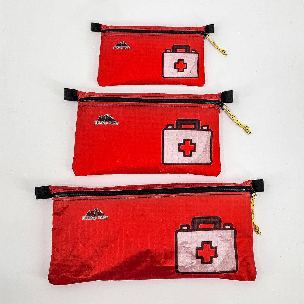 Ultralight zipper pouch organizer with classic patterns by Hilltop Packs LLC, featuring multiple compartments for storage.