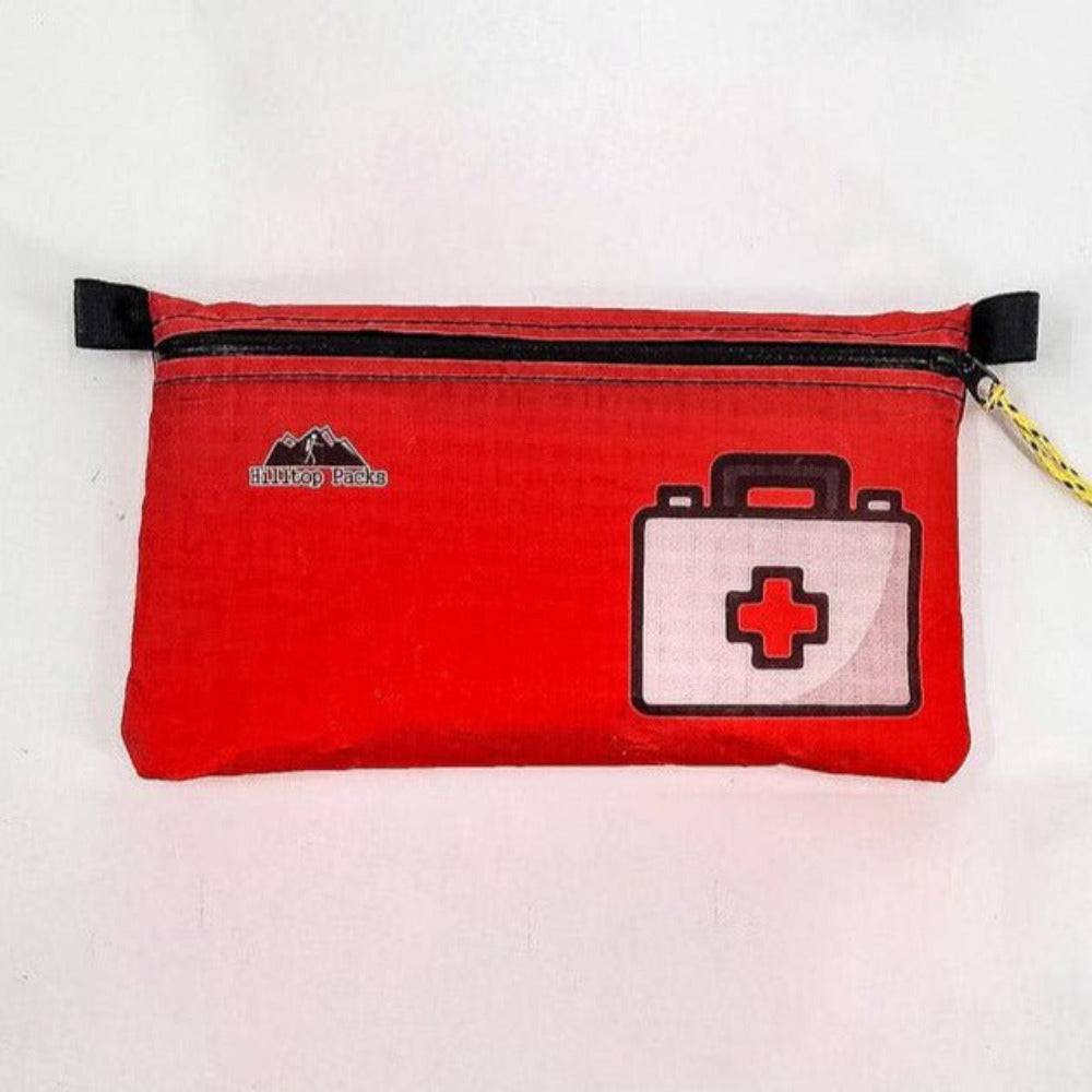 White ultralight zipper pouch organizer with classic patterns by Hilltop Packs LLC for travel or storage.