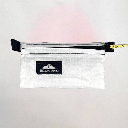 White ultralight zipper pouch organizer with classic pattern by Hilltop Packs LLC, compact and lightweight storage solution.