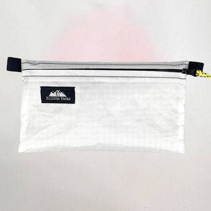 White ultralight zipper pouch organizer with classic pattern from Hilltop Packs LLC, ideal for travel and storage.