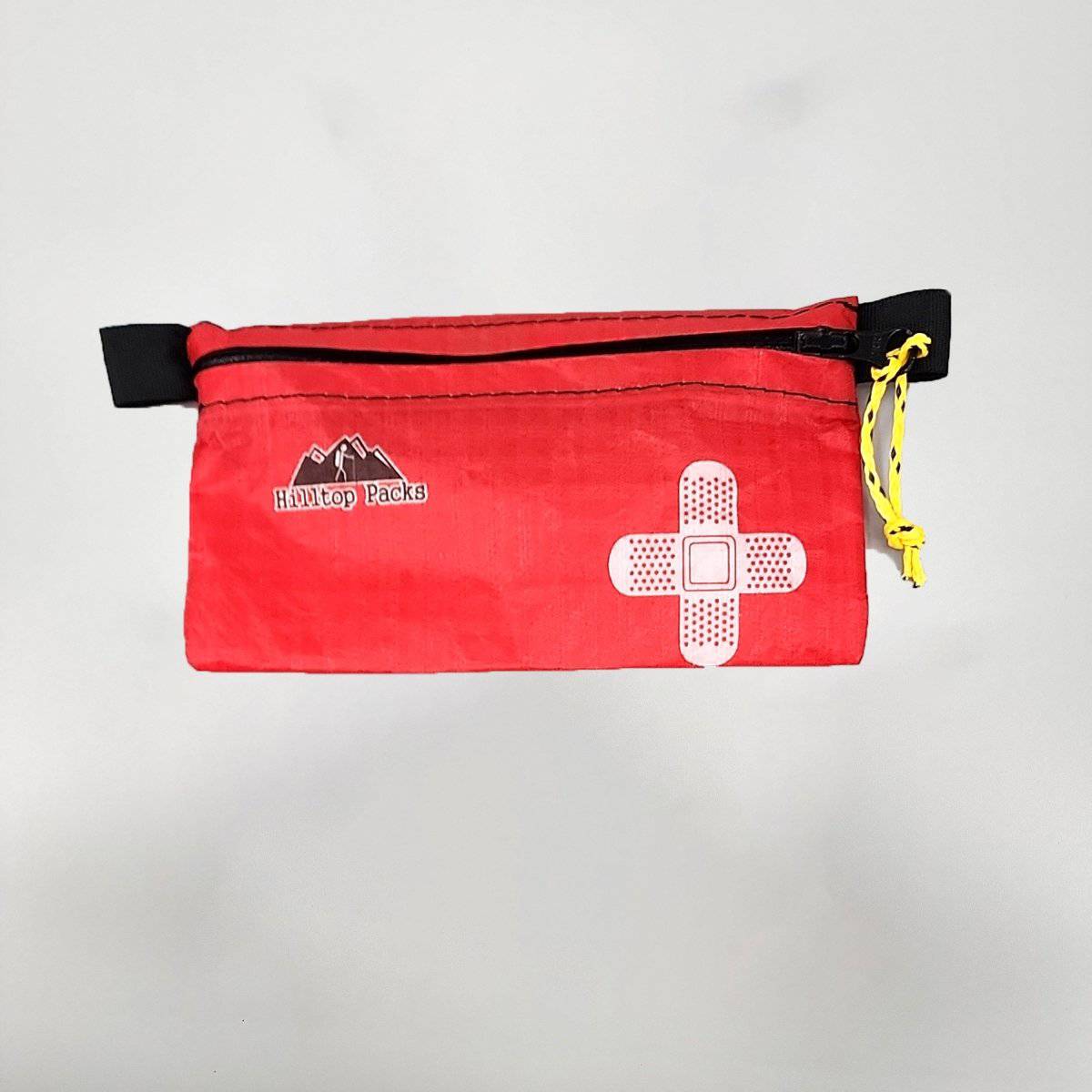 White ultralight zipper pouch organizer with classic pattern by Hilltop Packs LLC, compact and lightweight for travel and storage.
