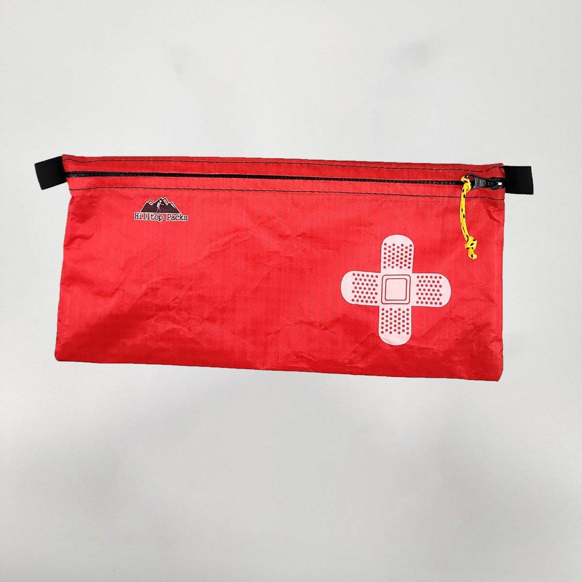White ultralight zipper pouch organizer with classic pattern design by Hilltop Packs LLC. Compact and lightweight storage solution.