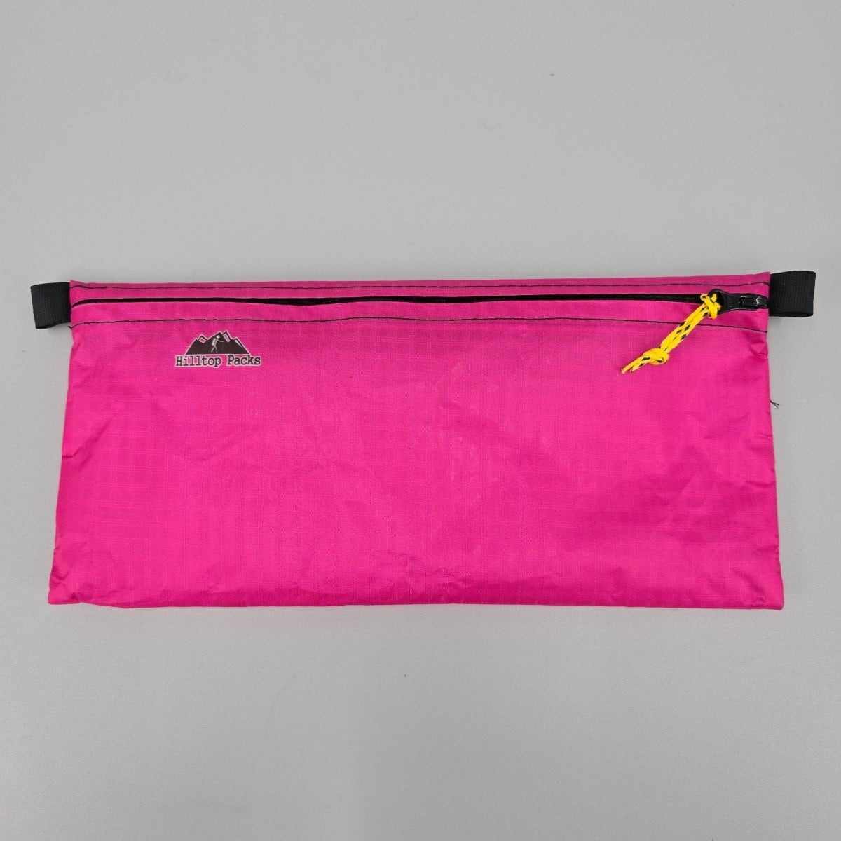 White ultralight zipper pouch organizer with classic pattern from Hilltop Packs LLC, compact and ideal for travel or daily use.