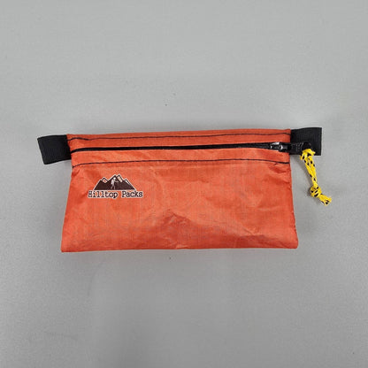 White ultralight zipper pouch organizer with classic pattern from Hilltop Packs LLC, ideal for organizing small essentials.
