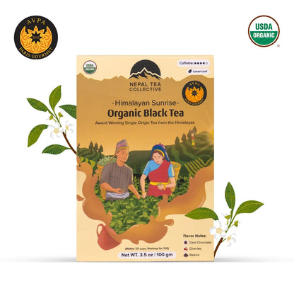 Organic Himalayan Sunrise Nepal Tea in a teacup, showcasing the rich amber color of the Kanchanjangha Noir tea.