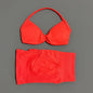Women’s seamless yoga gym set with strappy bra and high-waist scrunch shorts, perfect for workout and fitness activities.