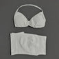 Histello gym sports set for women with seamless strappy yoga bra and high-waist scrunch shorts, ideal for fitness workouts.