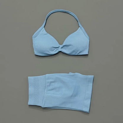 Histello women's 2-piece yoga set with seamless strappy bra and high-waist scrunch shorts, ideal for workout and fitness activities.