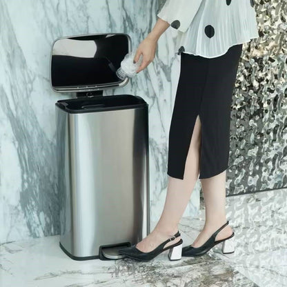 HomePacific 8-gallon stainless steel kitchen trash can with step-on lid, sleek and durable for waste disposal.