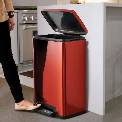 Stainless steel 13-gallon kitchen trash can with step lid in copper red finish, by HomePacific, in a modern kitchen setting.