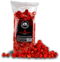 Junior Snacks Co. Hot Cheddar Popcorn bag with a pile of cheesy, spicy popcorn on a white background.