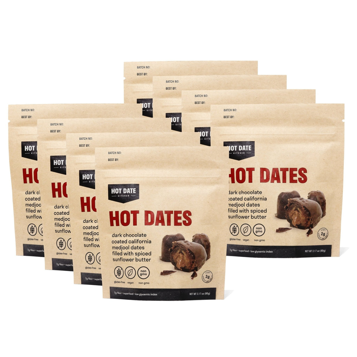Eight packs of Hot Date Kitchen spiced dark chocolate stuffed Medjool dates, candied fruit with chocolate coating in pouches.