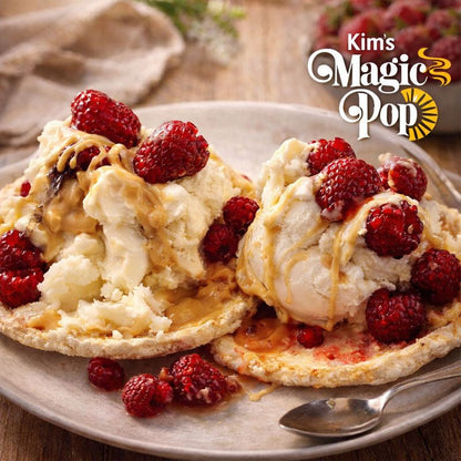 Kim's Magic Pop Strawberry Flavor ice cream dessert in a bowl with a spoon, showcasing a creamy, pink strawberry treat.