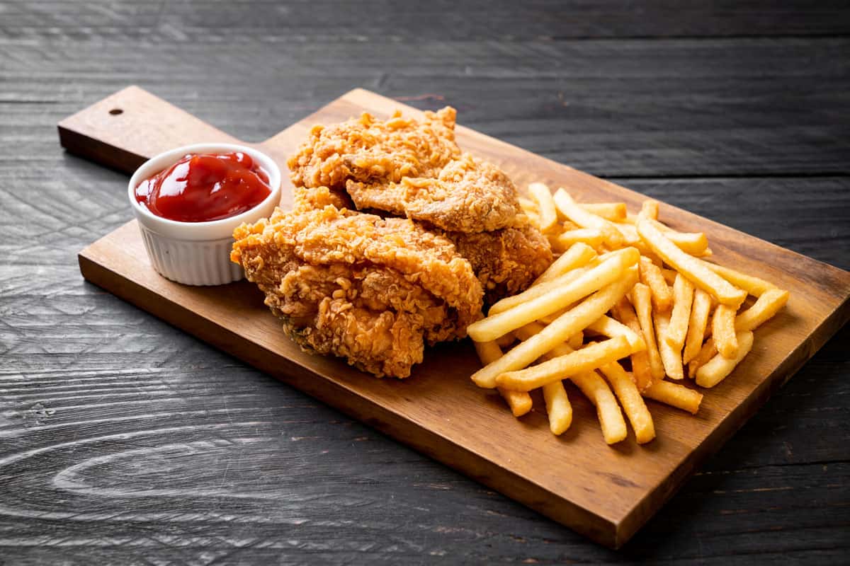Igotchu Seasonings Fried Chicken & Fish Coating Mix in a jar, perfect for seasoning fried chicken and fish with flavorful spices.