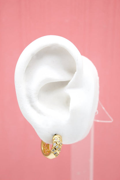 18K gold filled thick huggies earrings with slanted clear CZ cubic zirconia stones by MIA Jewelry