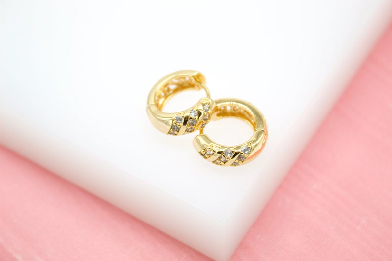18K gold filled thick huggies earrings with slanted clear CZ cubic zirconia stones, stylish jewelry by MIA Jewelry