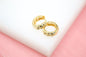 18K gold filled thick huggies earrings with slanted clear CZ cubic zirconia stones, stylish jewelry by MIA Jewelry