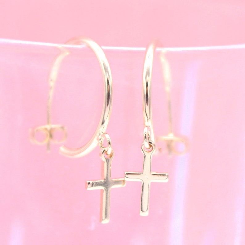 Gold filled cross open hoop earrings by MIA Jewelry featuring dangle drop design and stud backing.