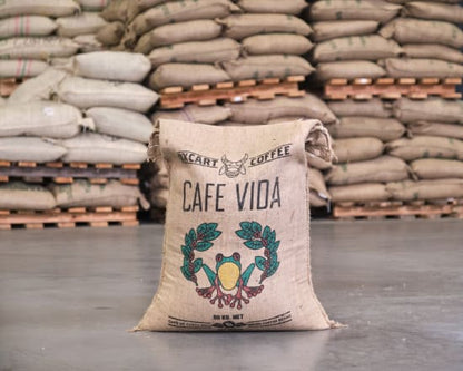 Roasted Costa Rica Cafe Vida coffee beans by Good Brothers Coffee LLC, showing a close-up of the freshly roasted beans.