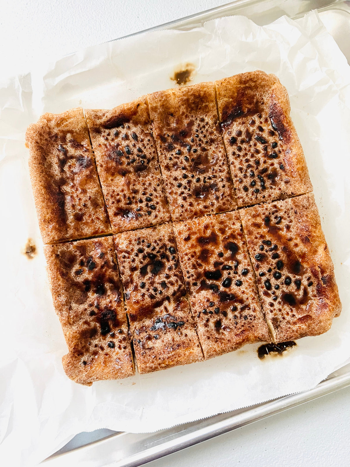 Let's Get Baked Artisan Desserts Bourbon Brûlée Snickerdoodle Blondies, rich dessert bars with caramelized sugar and cinnamon flavor.