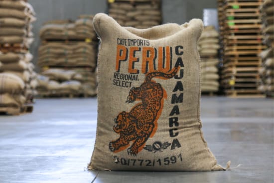 Roasted Peru Cajamarca coffee beans from Good Brothers Coffee LLC, displayed in a close-up image.