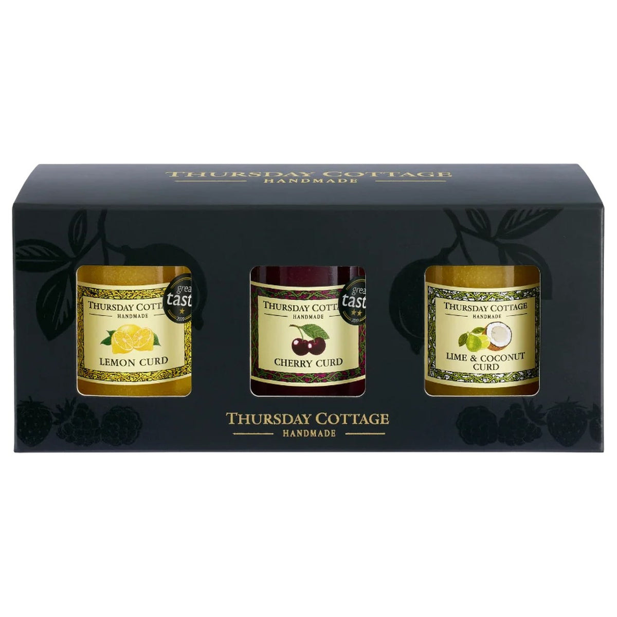 Thursday Cottage Deluxe Curd Trio Gift Set with three 330g containers of flavorful dairy curds on a white background.